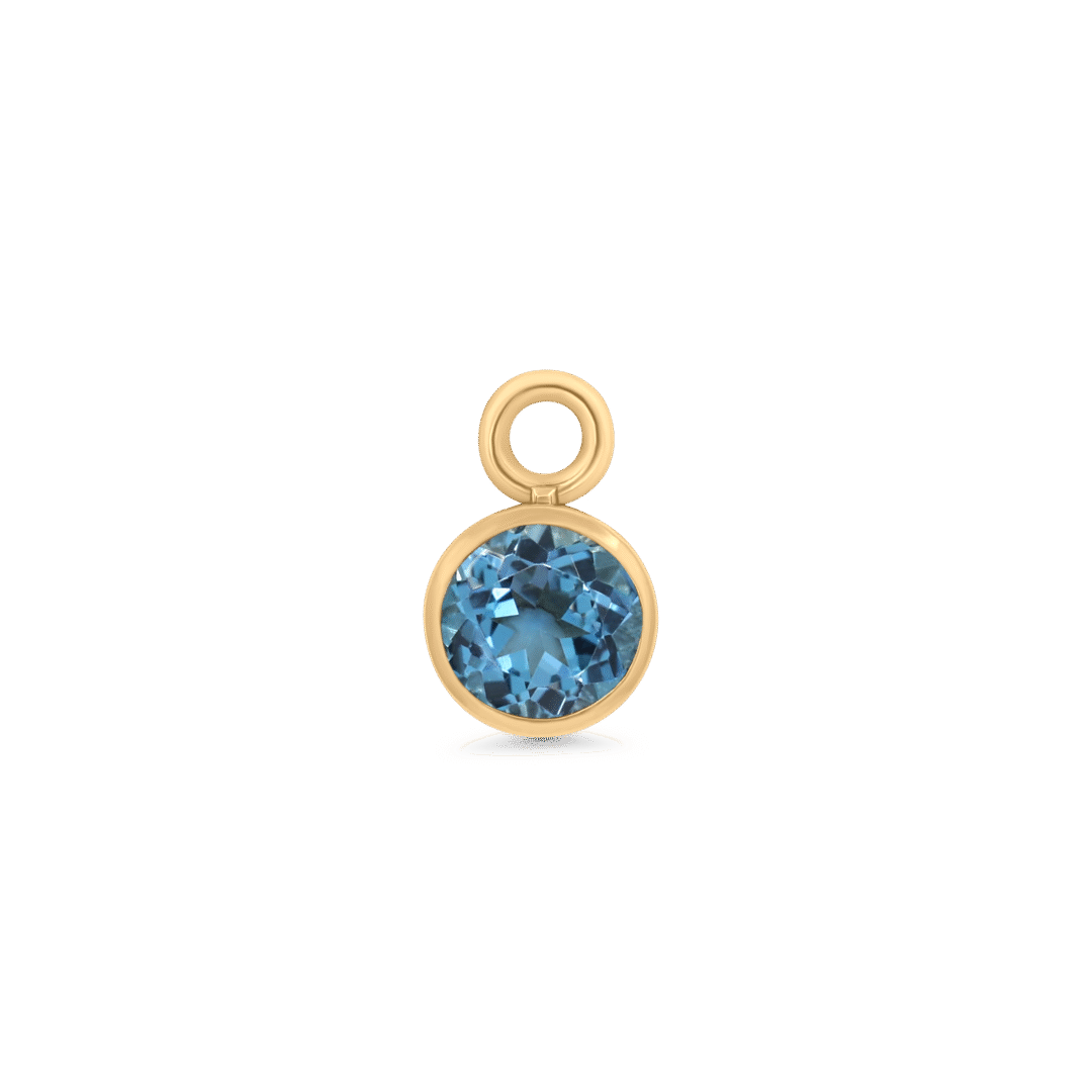 Orbit Topaz Charm