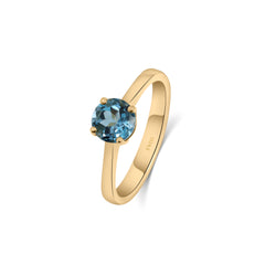 Serene Blue Topaz Solitaire Ring